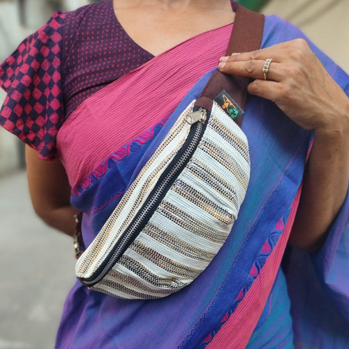 recharkha upcycled handwoven fanny pack waist pouch handmade from waste plastic bags and wrappers and cassette tapes  in India