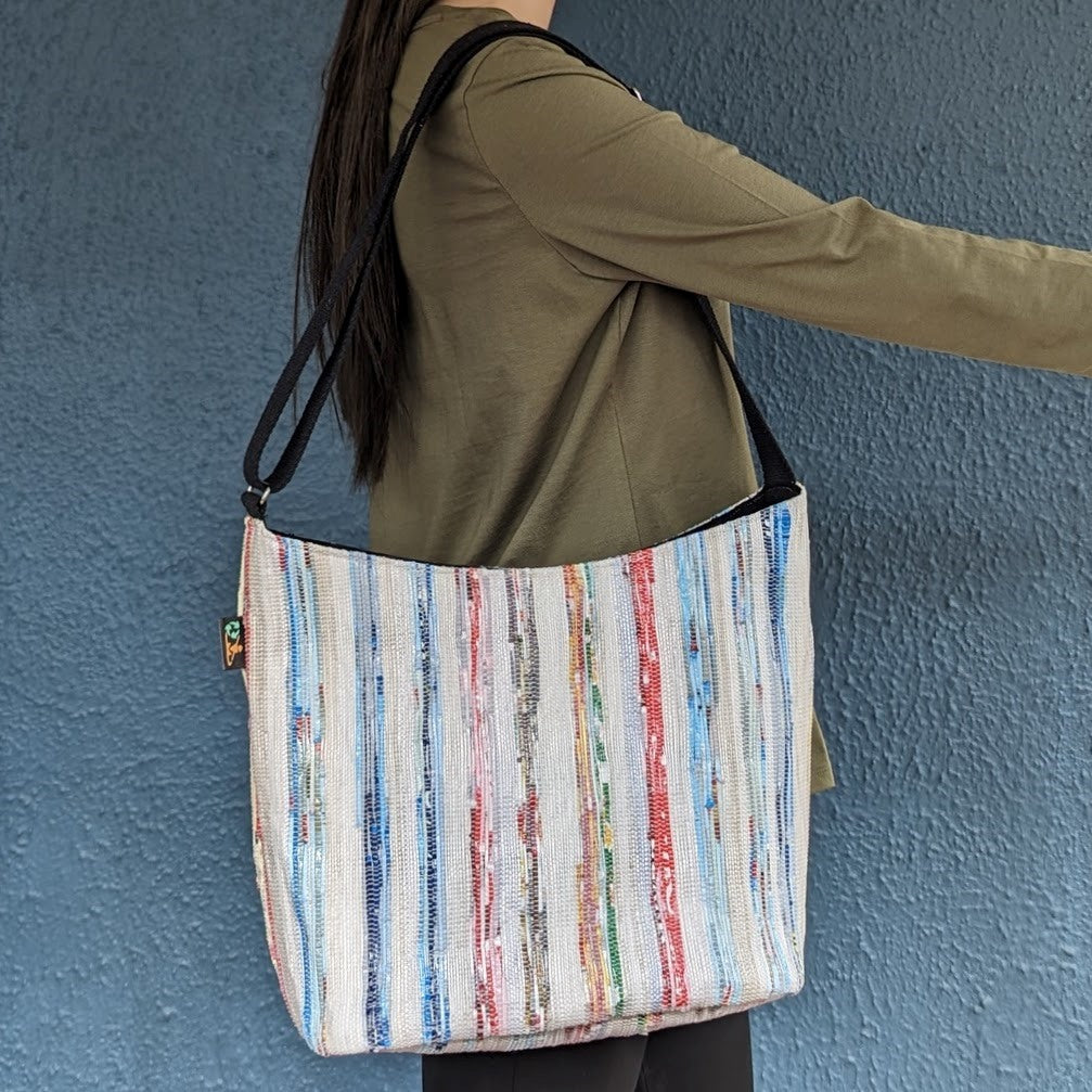 (EJ0324-112) White Waste Plastic Wrappers Upcycled Handwoven Eclipse Jhola Tote With Multicolored Stripes