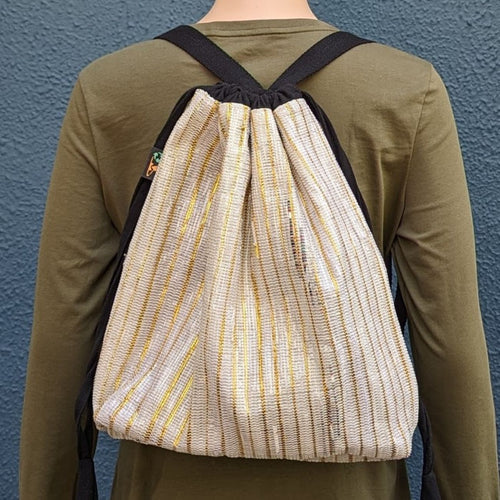 (NLBP0424-003) White Waste Plastic Wrappers with Golden Stripes Upcycled Handwoven Light Backpack
