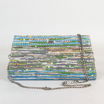 Multicolored woven handbag with a chain strap on a white background