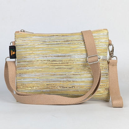 Yellow and beige crossbody bag on a light gray background