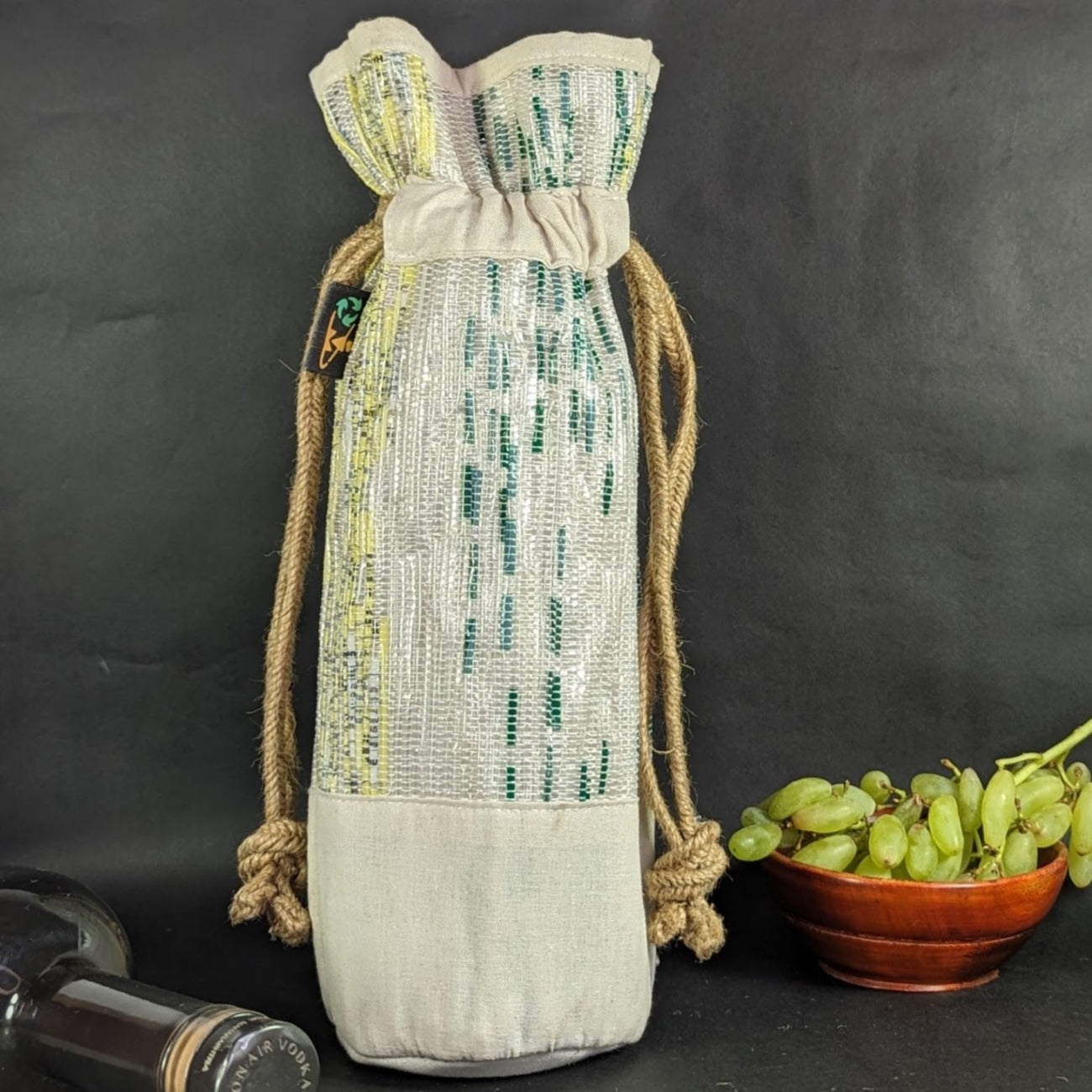 (WB0324-105) White and Green and Yellow D Mart Waste Plastic Wrappers Upcycled Handwoven Wine Bottle Holder