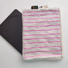recharkha upcycled handwoven tablet sleeve handmade from waste plastic bags cassette tapes and gift wrappers handcrafted in india